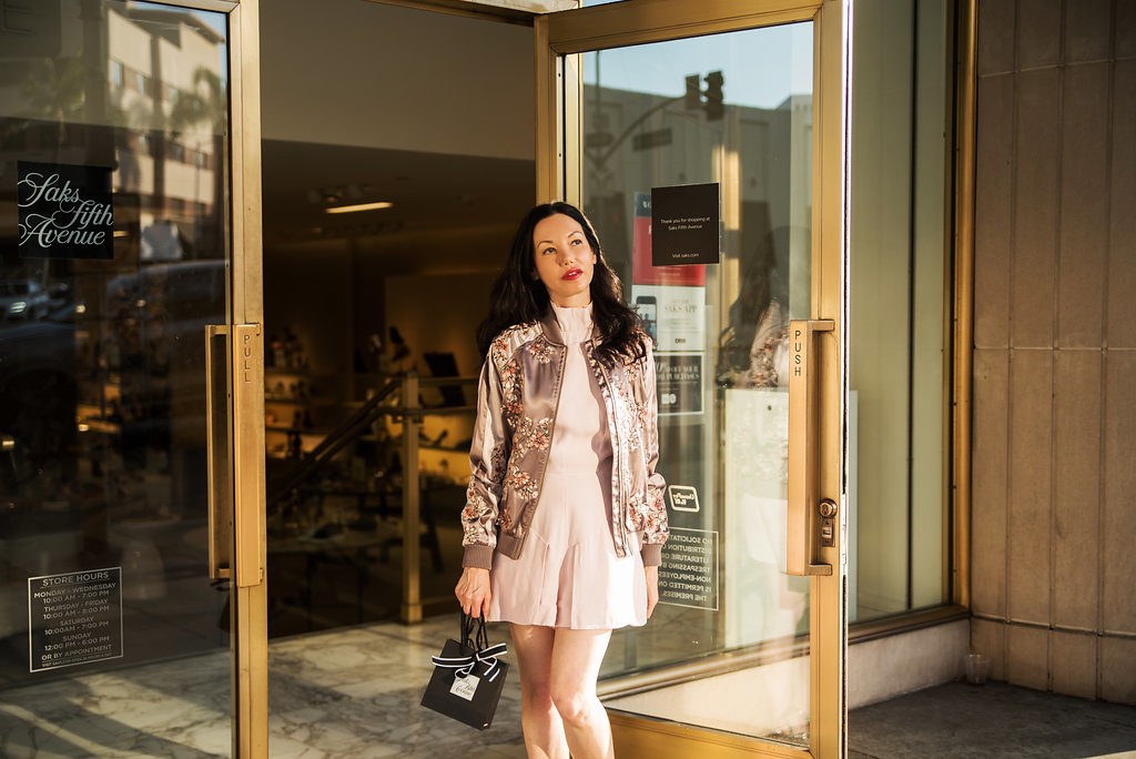 Pretty Little Shoppers Blog wears Lovers and Friends Bomber Jacket
